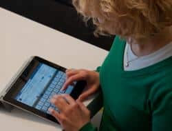 Schreier & Housewirth Family Law in Fort Worth, TX - Image of Woman on iPad