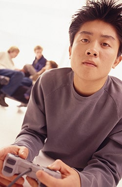 Schreier & Housewirth Family Law in Fort Worth, TX - Image of teenager playing videogames