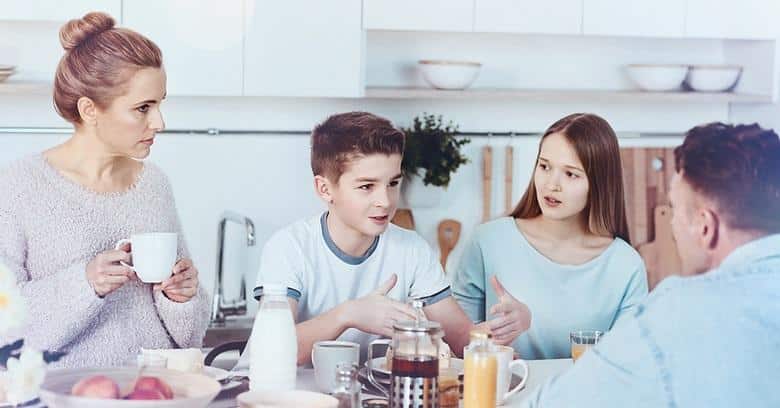 Schreier & Housewirth Family Law in Fort Worth, TX - Image of a family having conversation during breakfast